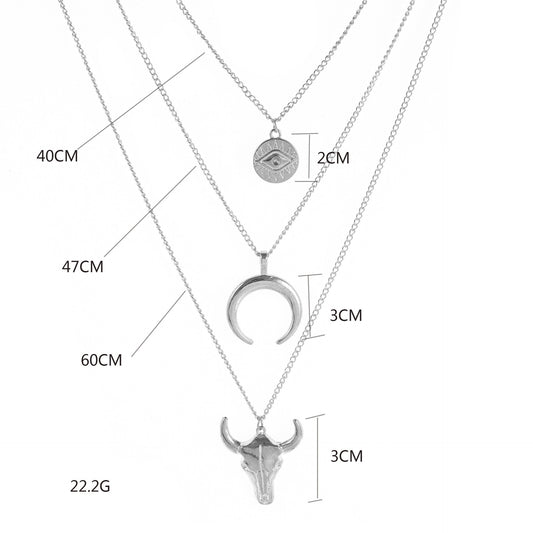 Measurement chart of layered necklaces with various pendants on a white background
