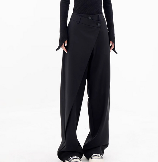 Riftline Asymmetrical Patchwork Trousers in black, front styling view