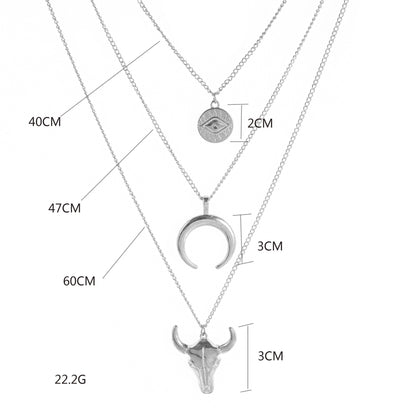 Measurement chart of layered necklaces with various pendants on a white background