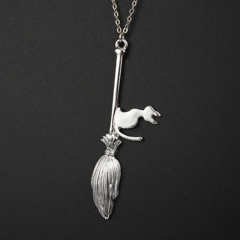 Familiar Flight silver-tone cat pendant necklace, detail view