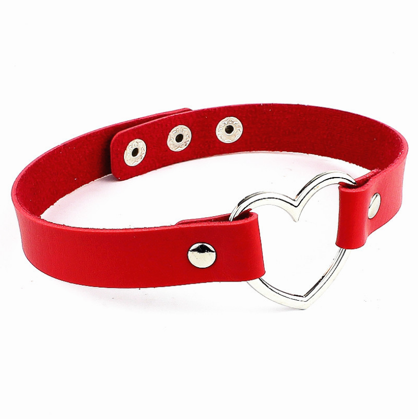 Red leather choker with a silver heart-shaped clasp on a white background