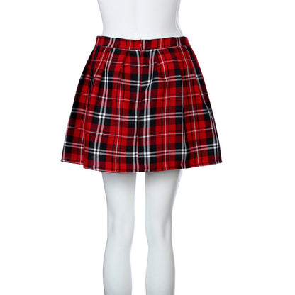 Red plaid skirt on a mannequin with white tights against a white background