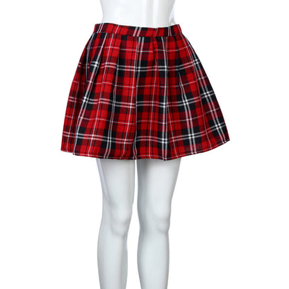Red plaid skirt on a mannequin with white tights against a white background