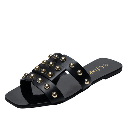 Everyday Rivet Flat Sandals in black, side view
