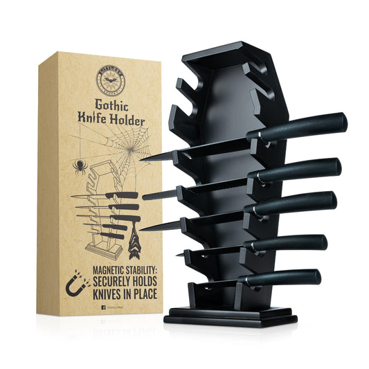 Black knife holder with knives and its packaging on a white background