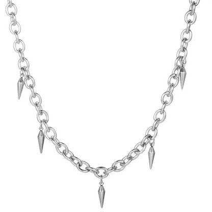 Silver chain necklace with spike-like pendants on a white background
