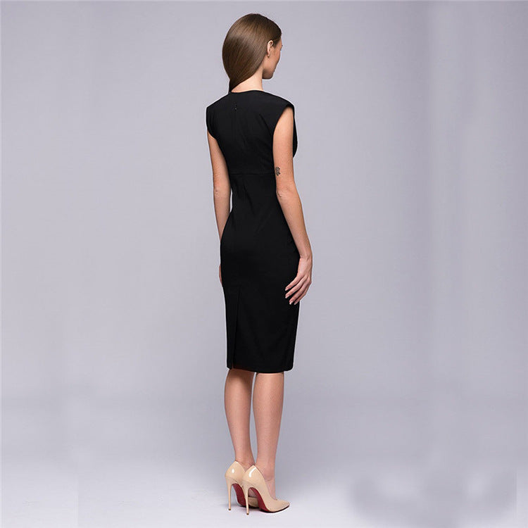 Woman wearing a black dress on a gray background