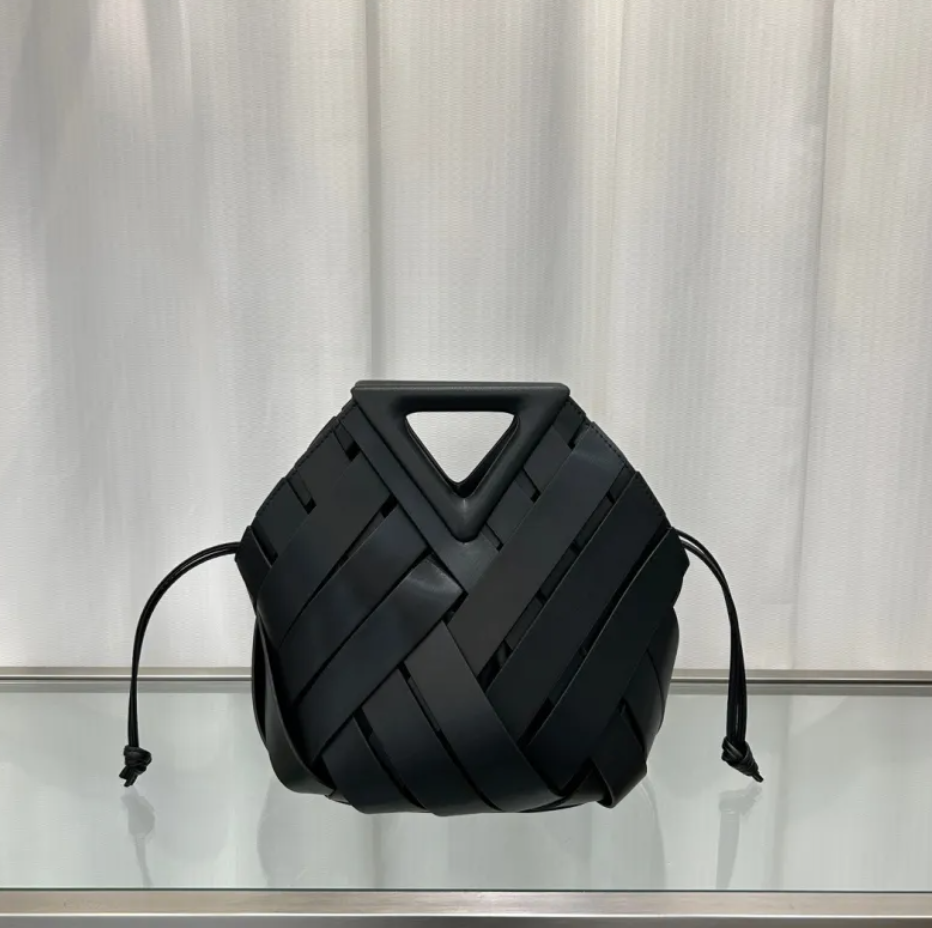 Obscura Woven Triangle-Buckle Crossbody Bag in black, front view