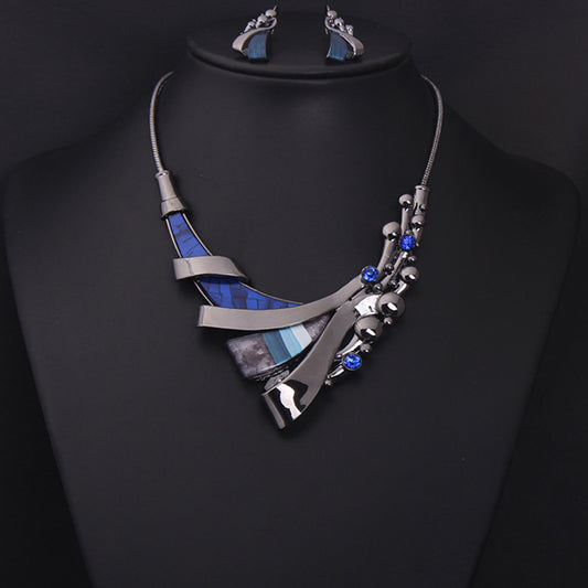 Jewelry set with necklace and earrings on a black background