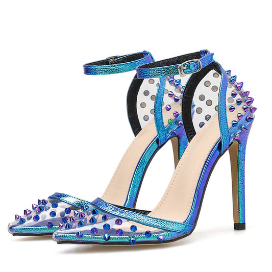Blue high-heeled sandals with studded details on a white background