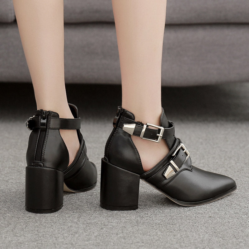Ravencut Block-Heel Ankle Boots in black, back styling view