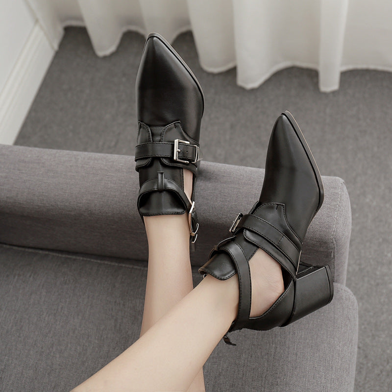 Ravencut Block-Heel Ankle Boots in black, top styling view