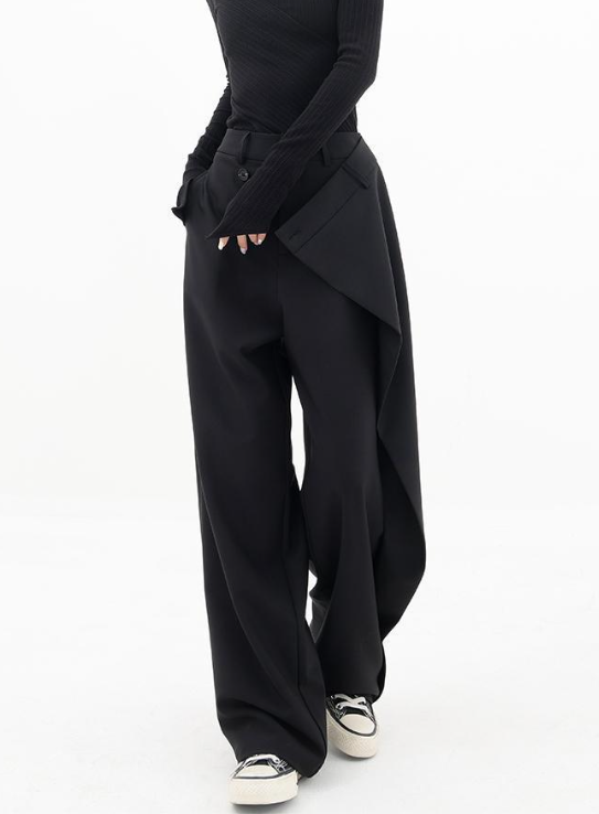Riftline Asymmetrical Patchwork Trousers in black, alternate front styling view