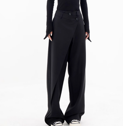 Riftline Asymmetrical Patchwork Trousers in black, front styling view