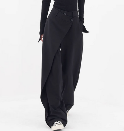 Riftline Asymmetrical Patchwork Trousers in black, walking front view