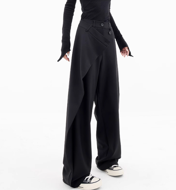 Riftline Asymmetrical Patchwork Trousers in black, side styling view
