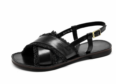 Sable Cross-Strap Roman Sandals in black, side view