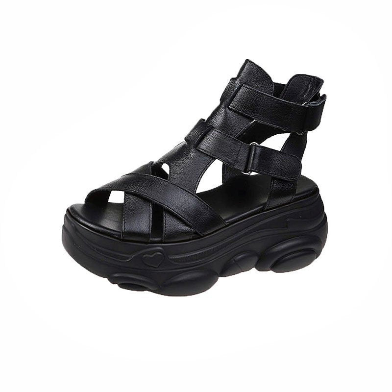 Umbra Flat Platform Sandals in black, side view