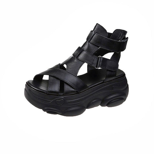Umbra Flat Platform Sandals in black, side view