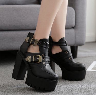 Vanta Chunky-Heel Ankle Boots in black, side styling view
