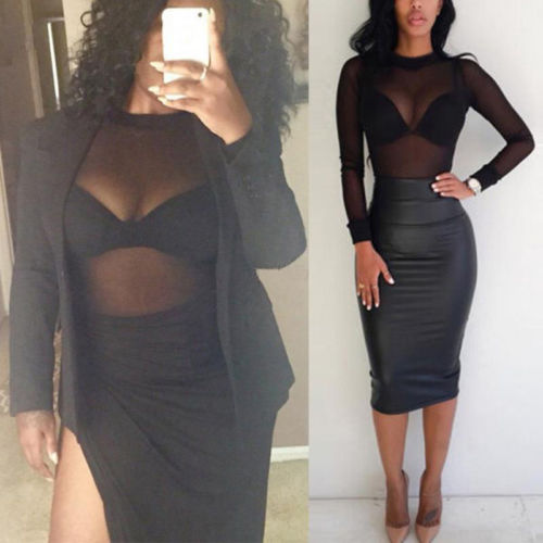 Woman modeling the Veilskin black sheer mesh long-sleeve top with a dark fitted skirt