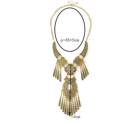 Gold statement necklace with a chain, ornate collar plate, and long dangling fringe, shown on a white background with black measurement lines and text indicating 45+5 cm width and 14 cm drop.